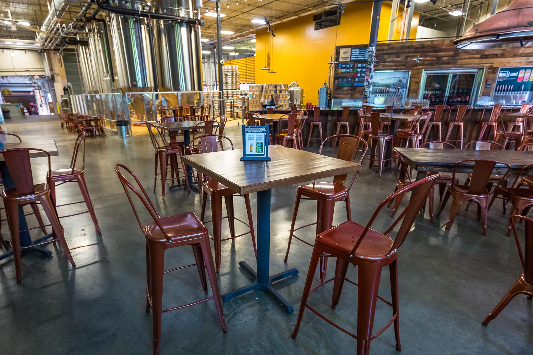 Utepils Brewing Wood Brewery Tables And Custom Bases—restaurant tabletop image.