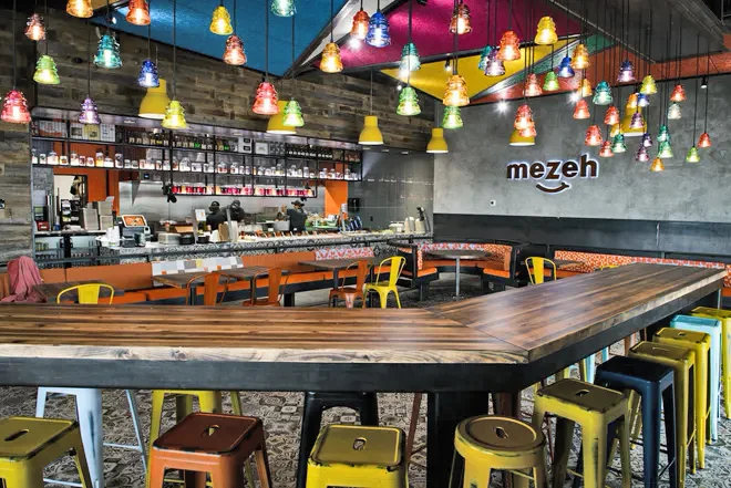 Mezeh Restaurant. A solid Wood, reclaimed pine, Bar Top built from salvaged barn wood.