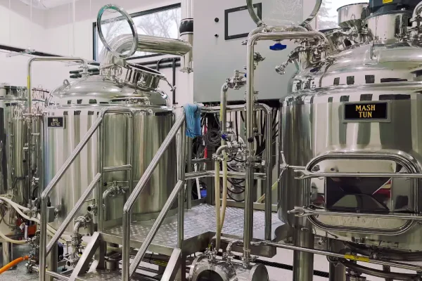 Wooden maple restaurant tabletops and bar tops at The Foxhole Brewery, alternate view.