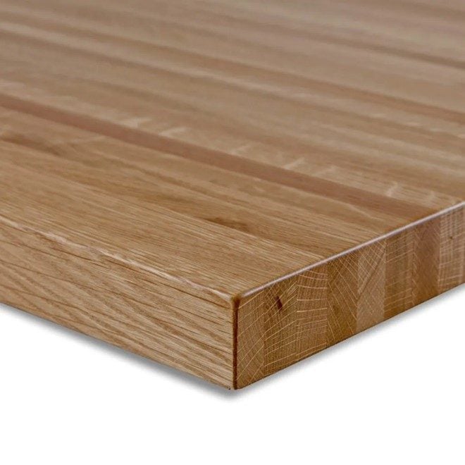 New Oak butcher block restaurant tabletops. Taken from a perspective view.