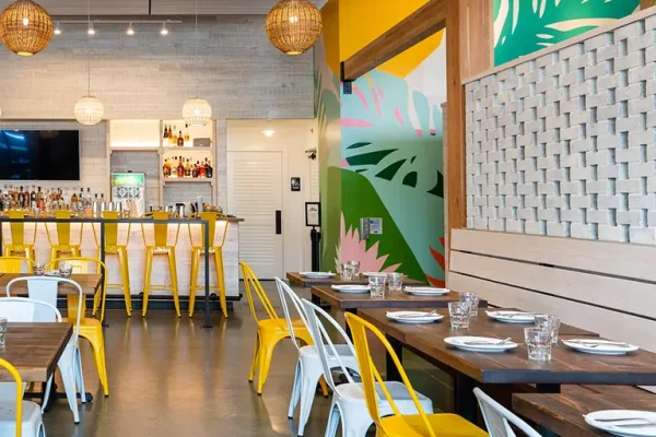 Yellow-themed restaurant interior, for sale.